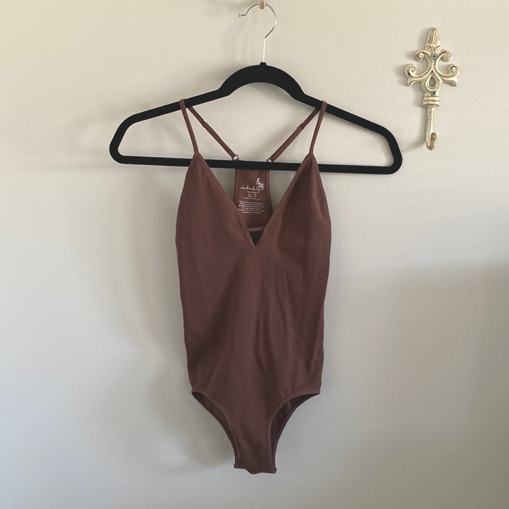 Brown body suit